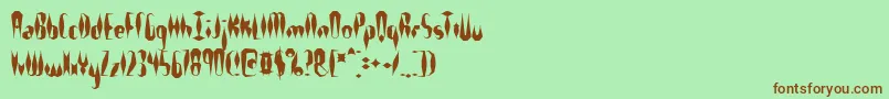 Quillexs Font – Brown Fonts on Green Background