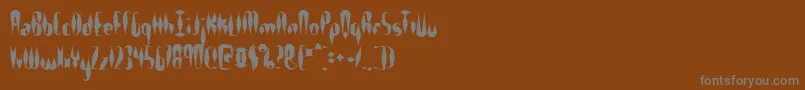 Шрифт Quillexs – серые шрифты на коричневом фоне