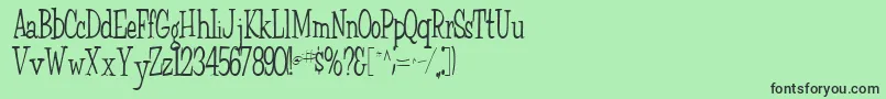 フォントFairchild85Regular – 緑の背景に黒い文字