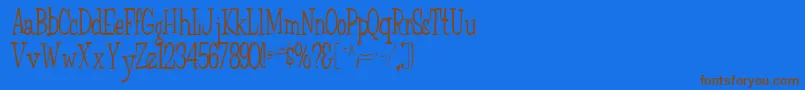 フォントFairchild85Regular – 茶色の文字が青い背景にあります。