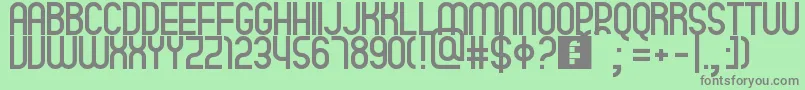 フォントQuatro – 緑の背景に灰色の文字