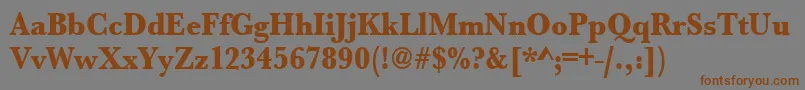 フォントUrwbaskertextbolextnar – 茶色の文字が灰色の背景にあります。