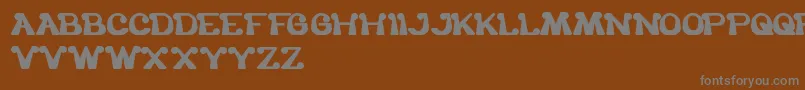 フォントTheOneAndOnlyMe – 茶色の背景に灰色の文字