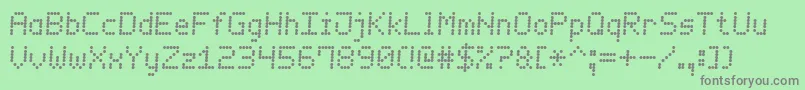 Fonte LedCounter7Italic – fontes cinzas em um fundo verde