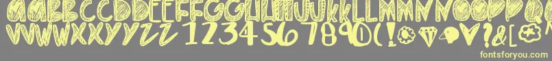 Everythinggold Font – Yellow Fonts on Gray Background