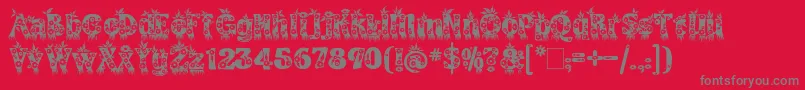 KingthingsAnnex-fontti – harmaat kirjasimet punaisella taustalla