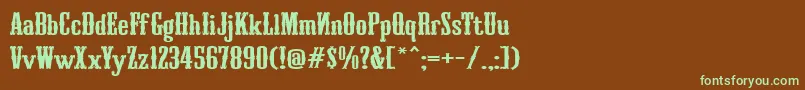 フォントTurandot – 緑色の文字が茶色の背景にあります。