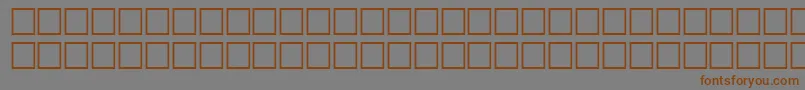 フォントMcsKhaybarSUNormal. – 茶色の文字が灰色の背景にあります。