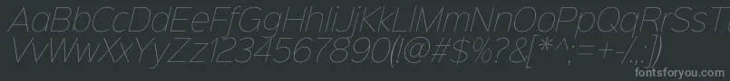 Шрифт Sinkinsans100thinitalic – серые шрифты на чёрном фоне