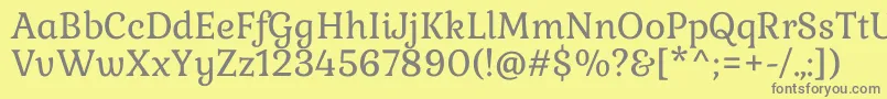 フォントGabrielaRegular – 黄色の背景に灰色の文字