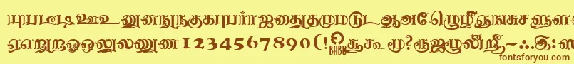 NagananthiniRegular Font – Brown Fonts on Yellow Background