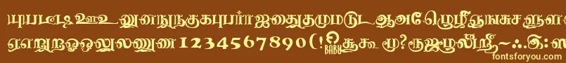 NagananthiniRegular Font – Yellow Fonts on Brown Background