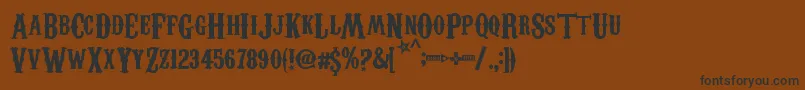 CarnivaleeFreakshow Font – Black Fonts on Brown Background