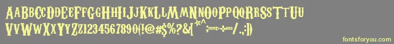 CarnivaleeFreakshow Font – Yellow Fonts on Gray Background