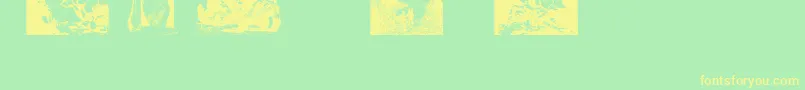 Шрифт FrazettabatsTest1 – жёлтые шрифты на зелёном фоне