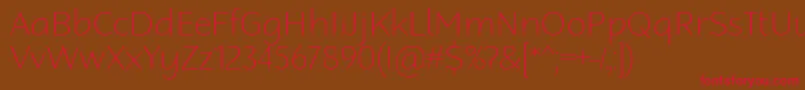 RobagaRoundedThin Font – Red Fonts on Brown Background