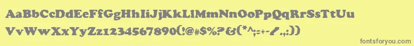 CharlemagneCondensed Font – Gray Fonts on Yellow Background