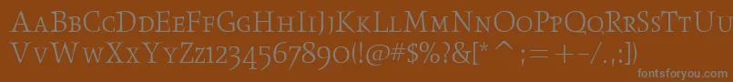 ObeliskltscitcTt-fontti – harmaat kirjasimet ruskealla taustalla