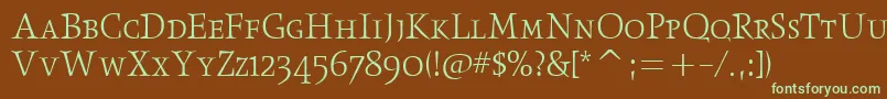 フォントObeliskltscitcTt – 緑色の文字が茶色の背景にあります。