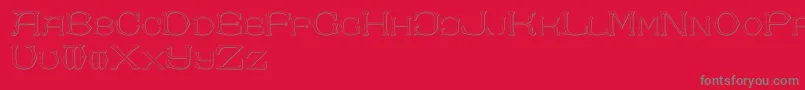 フォントDolphusMiegAlphabetTwo – 赤い背景に灰色の文字