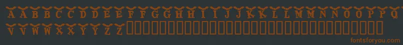 KrBatty Font – Brown Fonts on Black Background