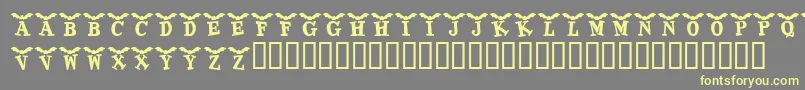 KrBatty Font – Yellow Fonts on Gray Background