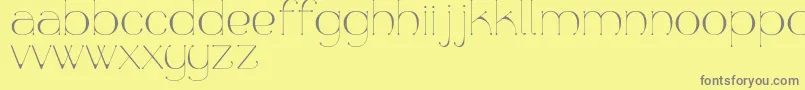 Aquapura Font – Gray Fonts on Yellow Background