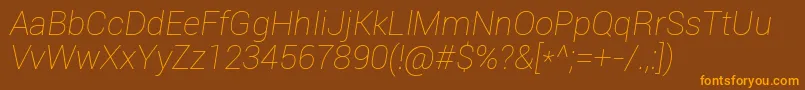 Шрифт Roboto Thinitalic – оранжевые шрифты на коричневом фоне