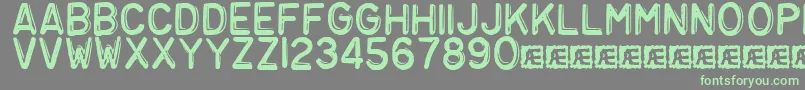 Embosst3-Schriftart – Grüne Schriften auf grauem Hintergrund