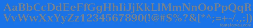 フォントVersaillesltstdBold – 青い背景に灰色の文字