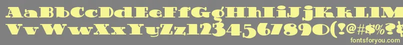 Guinnessextrastoutnf Font – Yellow Fonts on Gray Background