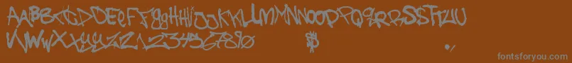 Thebattlecont Font – Gray Fonts on Brown Background