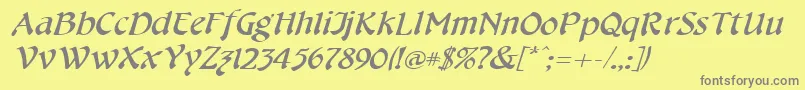 CheshirebroadItalic-fontti – harmaat kirjasimet keltaisella taustalla