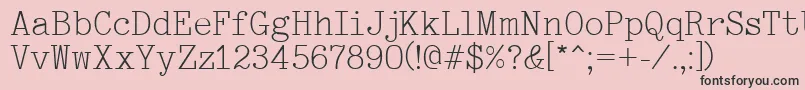 Fonte Typewriter – fontes pretas em um fundo rosa