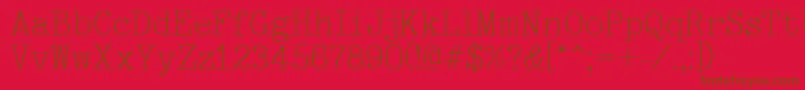フォントTypewriter – 赤い背景に茶色の文字