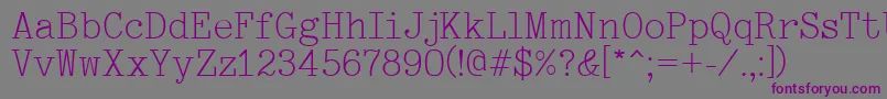 Typewriter-fontti – violetit fontit harmaalla taustalla