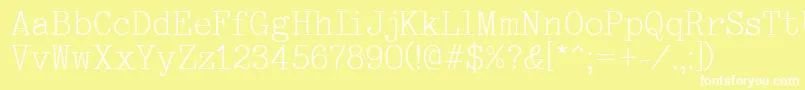 フォントTypewriter – 黄色い背景に白い文字