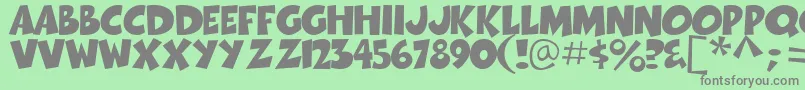 Thwack-Schriftart – Graue Schriften auf grünem Hintergrund