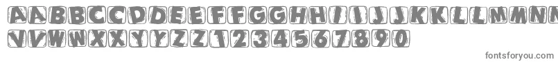 フォントWoodcuttedcapsblack – 白い背景に灰色の文字