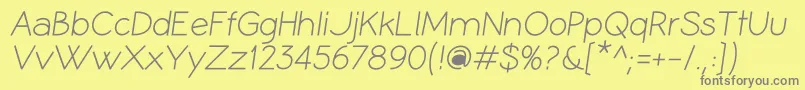 フォントCoameiRi – 黄色の背景に灰色の文字