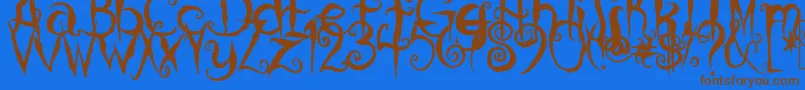 CoralinesCat-Schriftart – Braune Schriften auf blauem Hintergrund