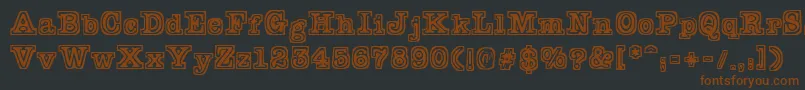 Typeblock-fontti – ruskeat fontit mustalla taustalla