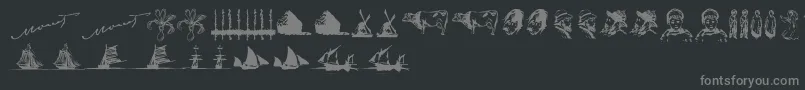 Czcionka P22monetSketches – szare czcionki na czarnym tle