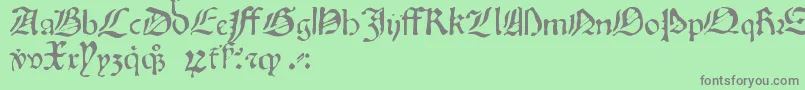 フォントOldprint – 緑の背景に灰色の文字