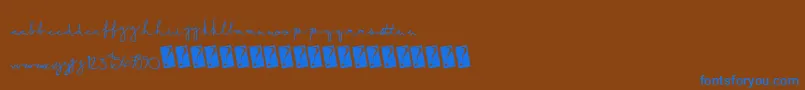 フォントSummerscript – 茶色の背景に青い文字