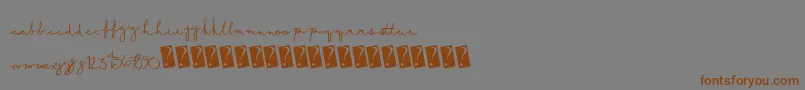 Summerscript-Schriftart – Braune Schriften auf grauem Hintergrund