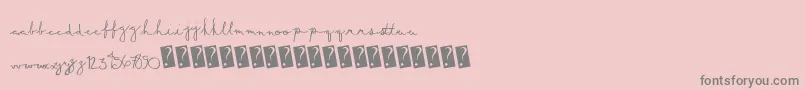 フォントSummerscript – ピンクの背景に灰色の文字