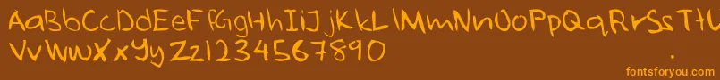 En savoir plus sur la police Ugly Police Ugly – polices orange sur fond brun