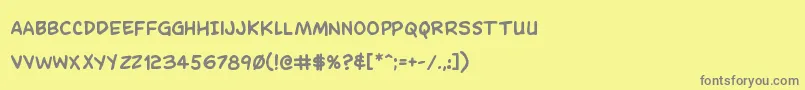 フォントDominomaskbold – 黄色の背景に灰色の文字