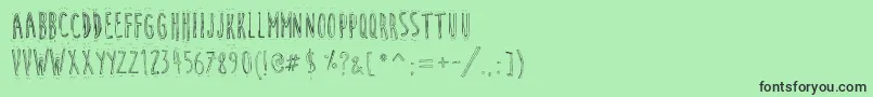 CuteCartoon Font – Black Fonts on Green Background